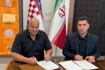 فاتح المپیک آتلانتا، سرمربی تیم ملی ایران شد