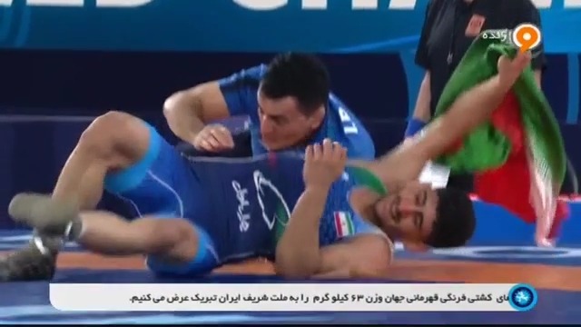 سالتو بارانداز محمد بنا به دلخانی پس از کسب مدال طلا و دور افتخار با پرچم ایران