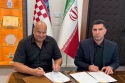 فاتح المپیک آتلانتا، سرمربی تیم ملی ایران شد