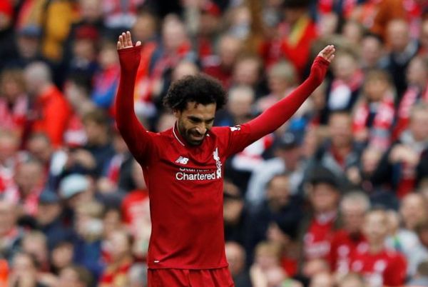 حرکت تحسین برانگیز صلاح در برخورد با هوادار نوجوان لیورپول عکس