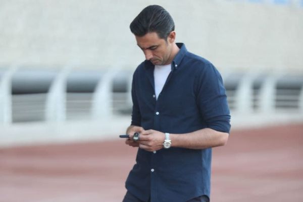 رحمتی با صلواتشمار، آیفون و رولکس کنار خط عکس