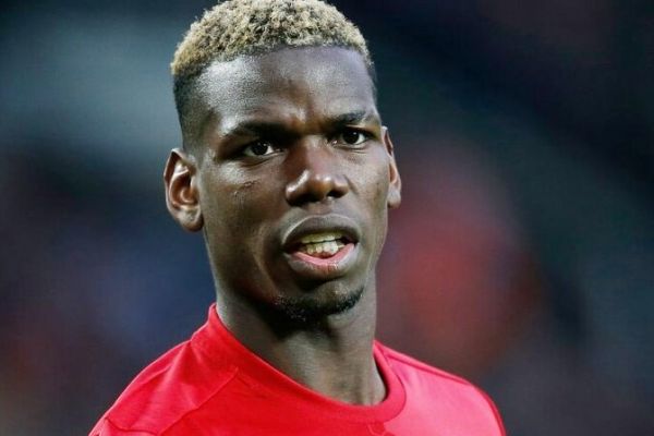 تصاویر؛ واکنش جالب پوگبا به شعار وولوزی ها علیه خودش