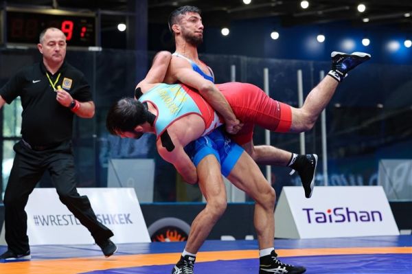 گرایی عصر امروز برای کسب سهمیه و مدال به روی تشک میرود