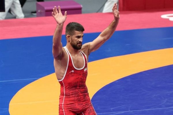 ترک مراسم تقدیر از سوی قهرمان کشتی بازیهای آسیایی بهخاطر ربع سکه