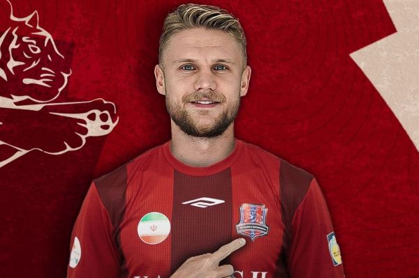 رسمی الکساندر مرکل به نساجی پیوست