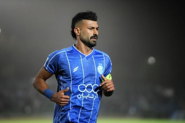  واکنش رامین به ادعای جنجالی کفشگری؛ قلب آبی را به رخ کشید   عکس