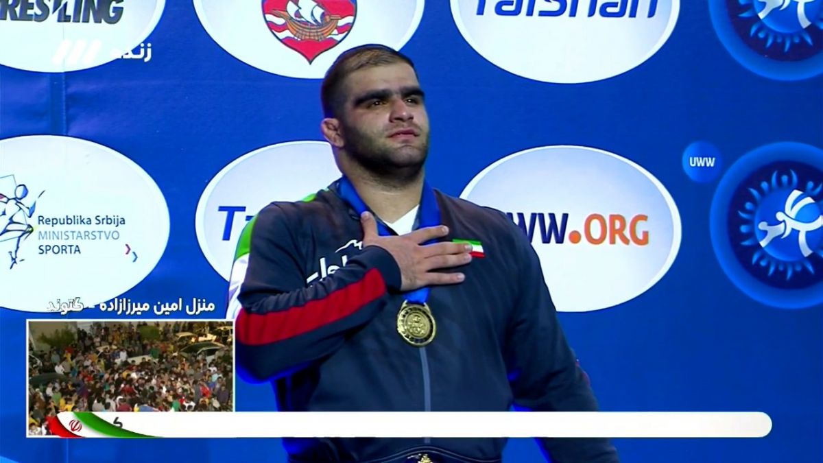 مراسم اهدای مدال طلا به امین میرزازاده در وزن 130 کیلوگرم