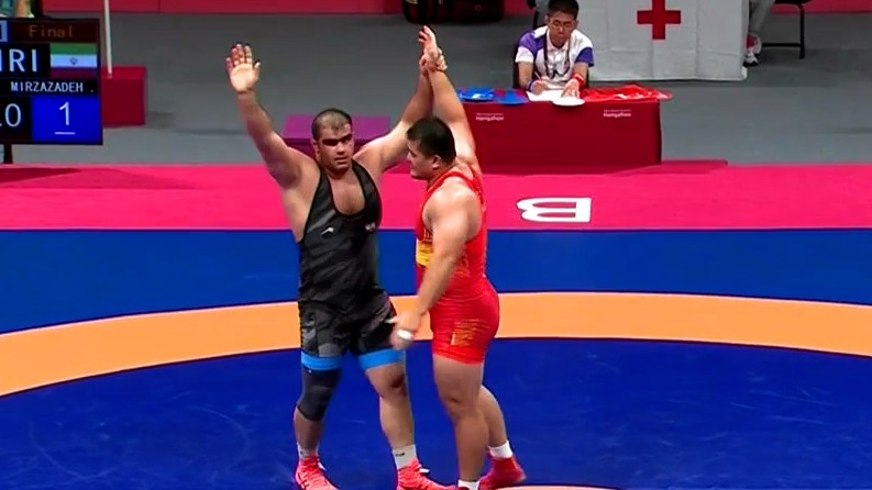 کسب مدال طلا توسط امین میرزازاده در بازیهای آسیایی هانگژو با برد سخت مقابل نماینده چین