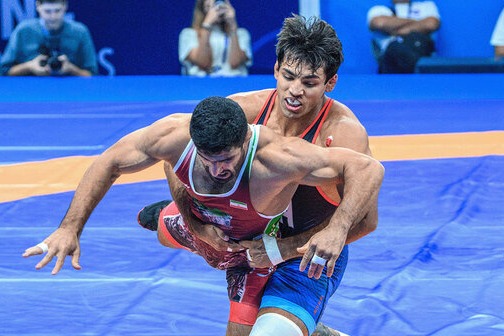 اولین واکنش کشتیگیر آمریکایی بعد از توهین به کامران قاسمپور