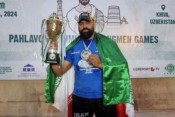 قدرت نمایی قویترین مرد ایران در ازبکستان قیطاسی قهرمان جام پهلوان محمود شد
