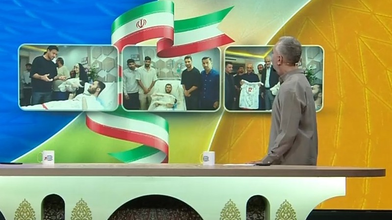 عیادت بازیکنان تیم ملی از جانباز پای لانچر در جنگ رمضان